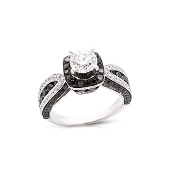 A diamond solitaire ring with a 1 carat round brilliant cut diamond in a white gold setting